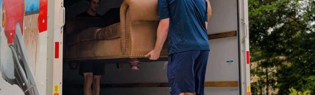 Chris-and-sam-taking-couch-into-truck-7x5-1-1024x705-1